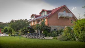 a house with bikes parked in front of it at Oaza Inn in Ohrid