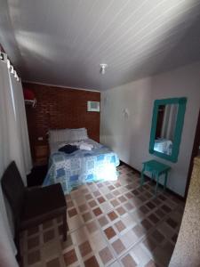 Cama ou camas em um quarto em Pousada Klein