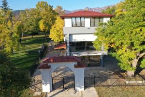 an aerial view of a house with a building at GRANDE SPA DELUXe STUDIOS in Sliven