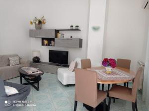 TV a/nebo společenská místnost v ubytování Appartamento Iasolino