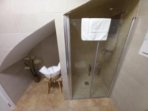a bathroom with a walk in shower and a walk in shower at SOBERANA JAVEA in Jávea