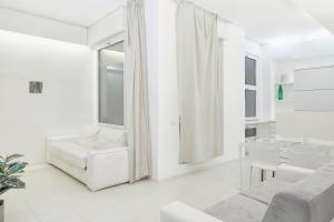 Postel nebo postele na pokoji v ubytování Prestige Boutique Homes-Duomo