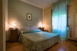 Postel nebo postele na pokoji v ubytování Hotel Relais Valle Orientina