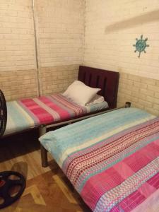 Postel nebo postele na pokoji v ubytování Villa mar