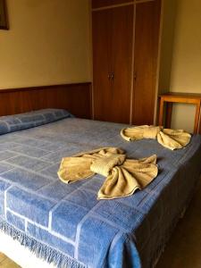 מיטה או מיטות בחדר ב-Hotel Ezpeleta