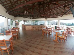 Restoran atau tempat lain untuk makan di Condomínio Flat Piemonte