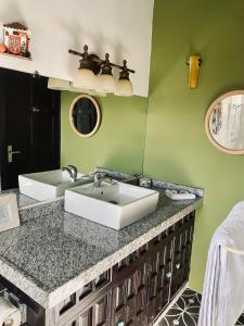 A bathroom at Villa Bougainvillea Aruba, the Tango Suite