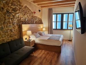 Ένα ή περισσότερα κρεβάτια σε δωμάτιο στο Apartamentos La Casina de los Músicos