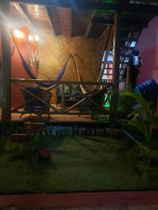 a view of a stage in a house at night at Chaleville Coqueiro 1001 in Luis Correia
