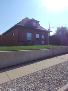 a house with a sidewalk in front of a house at Quiet upstairs studio close to town 420 friendly in Trinidad