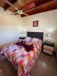 En eller flere senge i et værelse på Cabañas PAIGÜEN