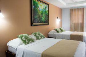 Voodi või voodid majutusasutuse Hotel Kevin toas