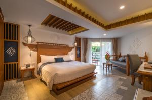 Кровать или кровати в номере Aonang Princeville Villa Resort & Spa - GHA WellHotel-Halal Certified, Krabi, Thailand