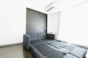 Posteľ alebo postele v izbe v ubytovaní Suncourt Hondori Garden Hills / Vacation STAY 7584