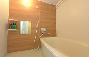 Ванна кімната в GLASS Yamahana EAST - Vacation STAY 7737