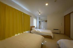 Una cama o camas en una habitación de SAKURA93 / Vacation STAY 80598