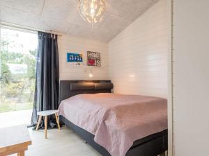 Кровать или кровати в номере Holiday home Fanø CXCIII