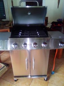 a grill with a stove top on a table at Villa LeoMar Diani Beach in Diani Beach