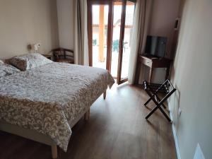 Postel nebo postele na pokoji v ubytování Albergo Diffuso Borgo Retrosi di Amatrice