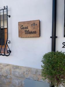 a sign on the side of a building at Casa Blanca in Castell de Castells