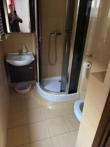 Een badkamer bij Apartament Promenada