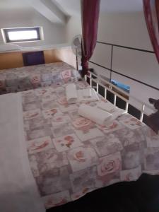 Posteľ alebo postele v izbe v ubytovaní Romeo and Juliet Apartaments