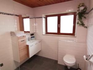 Ванна кімната в Apartmenthaus PARADISE