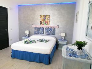 Posteľ alebo postele v izbe v ubytovaní Sciascia Apartment