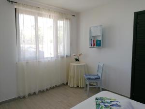 Posteľ alebo postele v izbe v ubytovaní Sciascia Apartment
