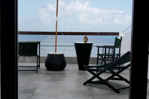 A balcony or terrace at Aram Yamí Boutique Hotel
