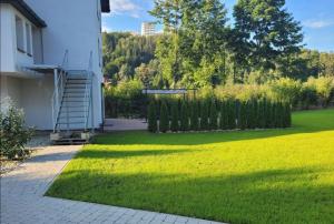 Zahrada ubytování Apartamenty Wisła Lipowa 16-4D