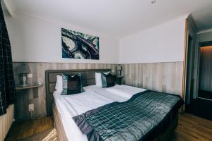 Postel nebo postele na pokoji v ubytování Hotel De Kalvaar