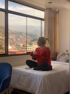 Postel nebo postele na pokoji v ubytování Cozy Room Cusco