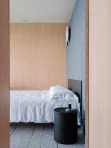 Postel nebo postele na pokoji v ubytování LARIUM BED & BREAKFAST - PIGRA