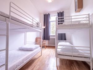 Postel nebo postele na pokoji v ubytování Körsbärskullen