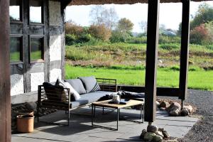 Zahrada ubytování Ruhe unter Reet-Haus mit Sauna, Whirlpool und Kamin