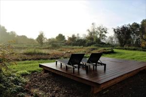 Zahrada ubytování Ruhe unter Reet-Haus mit Sauna, Whirlpool und Kamin