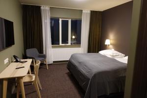 Letto o letti in una camera di Basalt Hotel