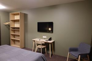 TV o dispositivi per l'intrattenimento presso Basalt Hotel