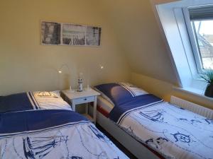Llit o llits en una habitació de Haus Kersi