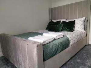 En eller flere senge i et værelse på Welcome to St Helena Dunoon, a traditional villa
