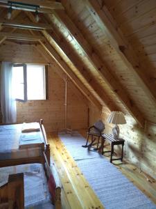 A bed or beds in a room at Vikendica Raković