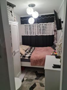 Posteľ alebo postele v izbe v ubytovaní Apartament przy Kopalni Złota