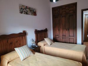 Posteľ alebo postele v izbe v ubytovaní El Corral de Dolores