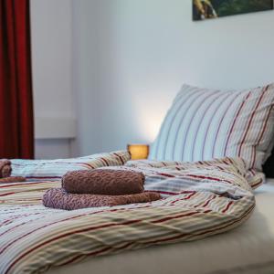 Posteľ alebo postele v izbe v ubytovaní Siegi's Apartments