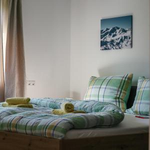 Posteľ alebo postele v izbe v ubytovaní Siegi's Apartments