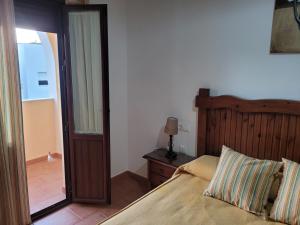 Posteľ alebo postele v izbe v ubytovaní El Corral de Dolores