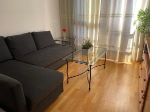 Ein Sitzbereich in der Unterkunft Apartment Madrid Barajas