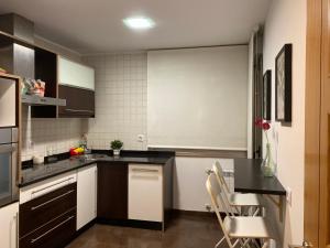 Köök või kööginurk majutusasutuses Ponte Canedo