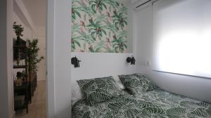 Posteľ alebo postele v izbe v ubytovaní Cute Central Apartment